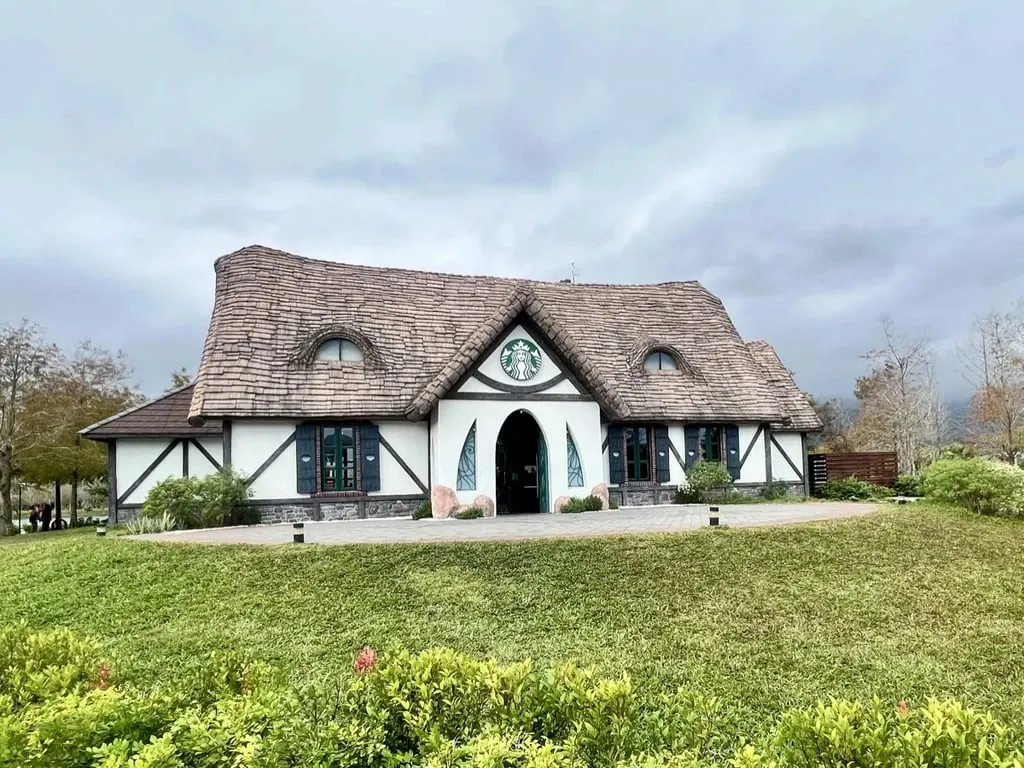 Starbucks Promisedland Resort side angle white walls timber framing — Taiwan Insider